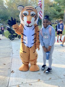 Taylor tiger mascot and student